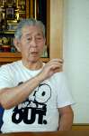 志布志事件で、うその自白を迫られた取り調べについて語る原告団長の浜野博＝２０１５年４月２６日、志布志市