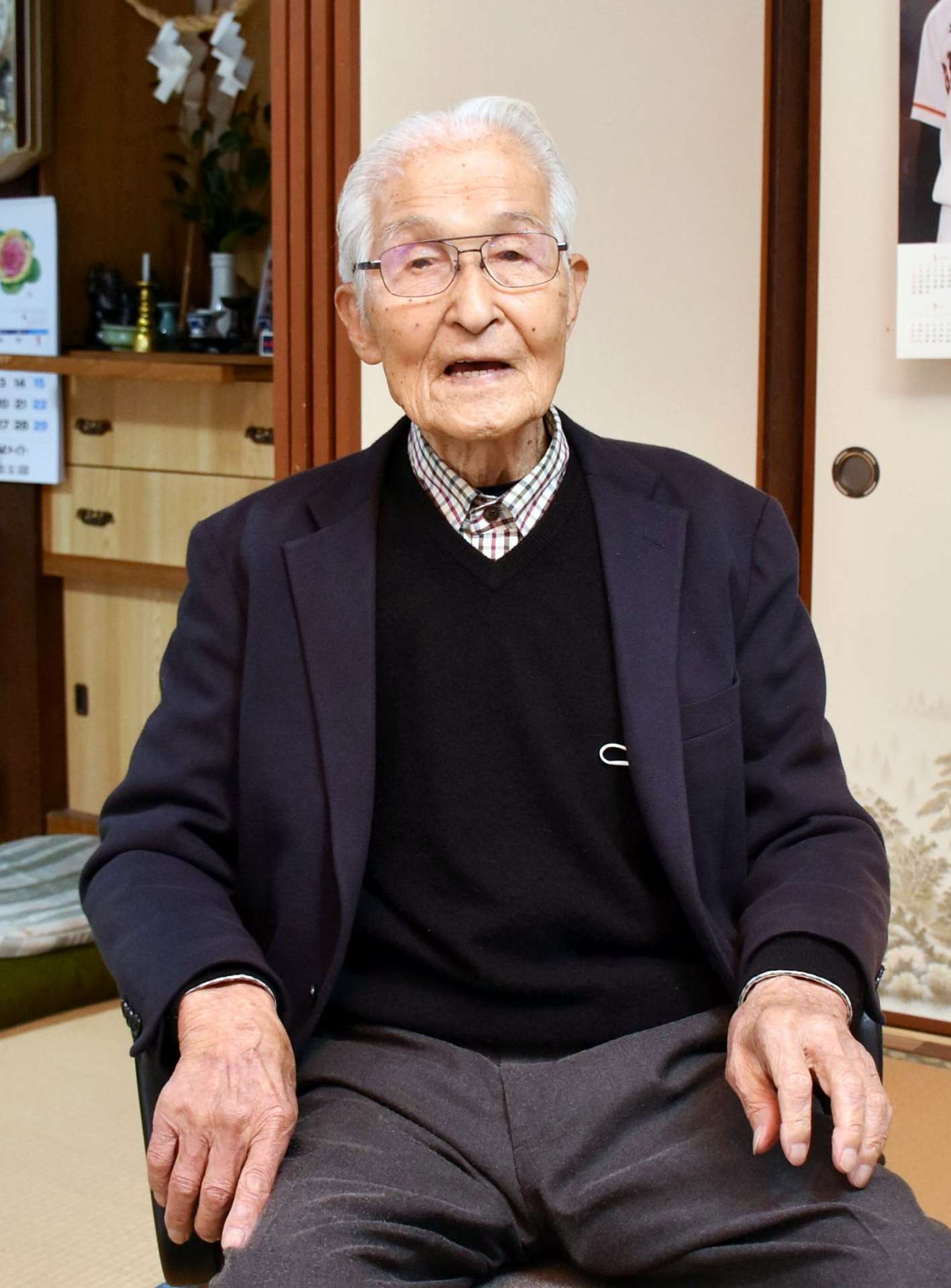 「若い人が犠牲になる戦争は二度としてはいけない」と語る遠矢文雄さん＝大崎町仮宿