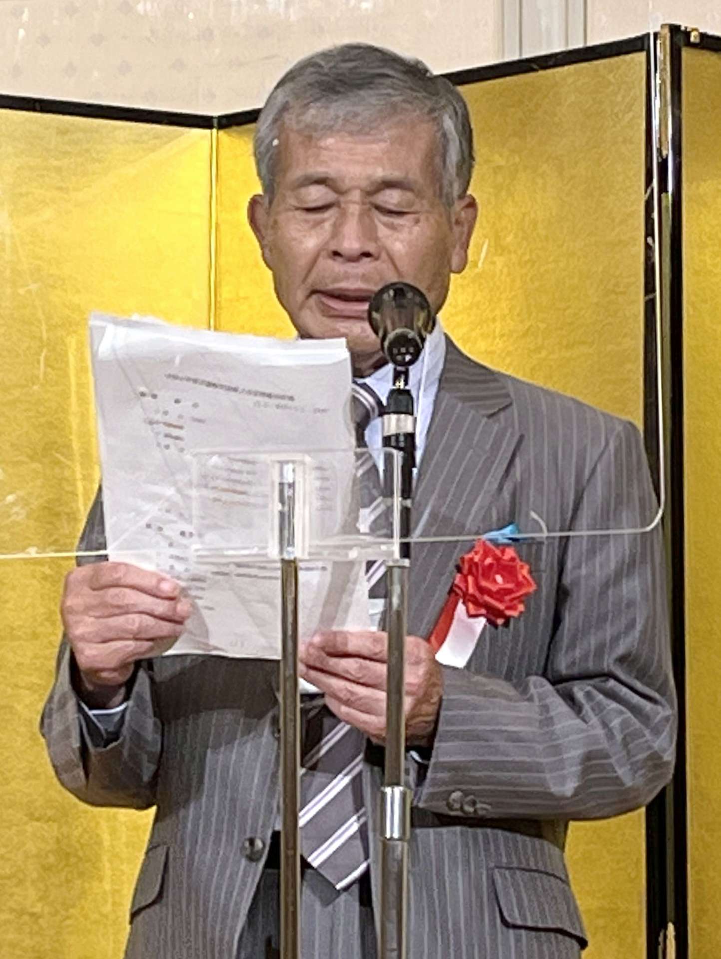 稲盛和夫会長のメッセージを代読する大園辰夫幹事長＝京都