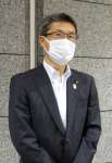 記者の質問に答える河野俊嗣知事＝９日、防衛省