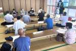 研究者の意見を聞く基地整備計画に反対する市民＝１８日、西之表市民会館