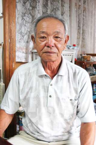 滑空訓練の様子を話す松永実信さん