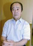 インタビューに答える市川健一さん＝４日、鹿屋市輝北