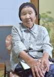 「自決を覚悟し、みんなで水杯を取った」と語る長野サチエさん＝曽於市末吉町深川
