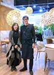 明治創業の婦人服店の一角にカフェ「ｉｔｏｓｈｉｍａｃｃｏ」を開いた田之上慶三郎さん、真喜子さん夫妻＝福岡県糸島市