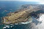 自衛隊基地整備が進む馬毛島＝８日、西之表市の馬毛島上空（本社チャーター機から）
