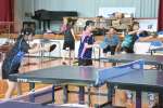 練習に励む上甑卓球クラブのジュニア選手ら＝薩摩川内市上甑の旧平良小学校