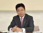 質問に答える加藤勝信氏＝東京・永田町の国会記者会館