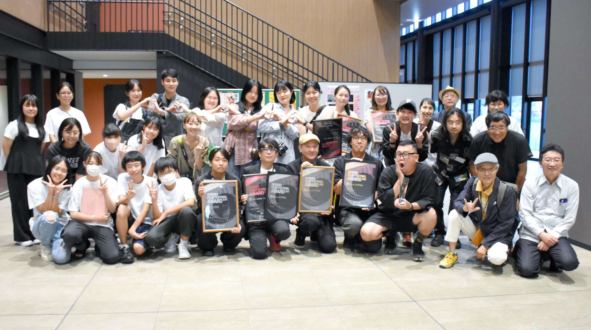 いぶすき映画祭で上映された１２作品の監督とスタッフら＝指宿市民会館