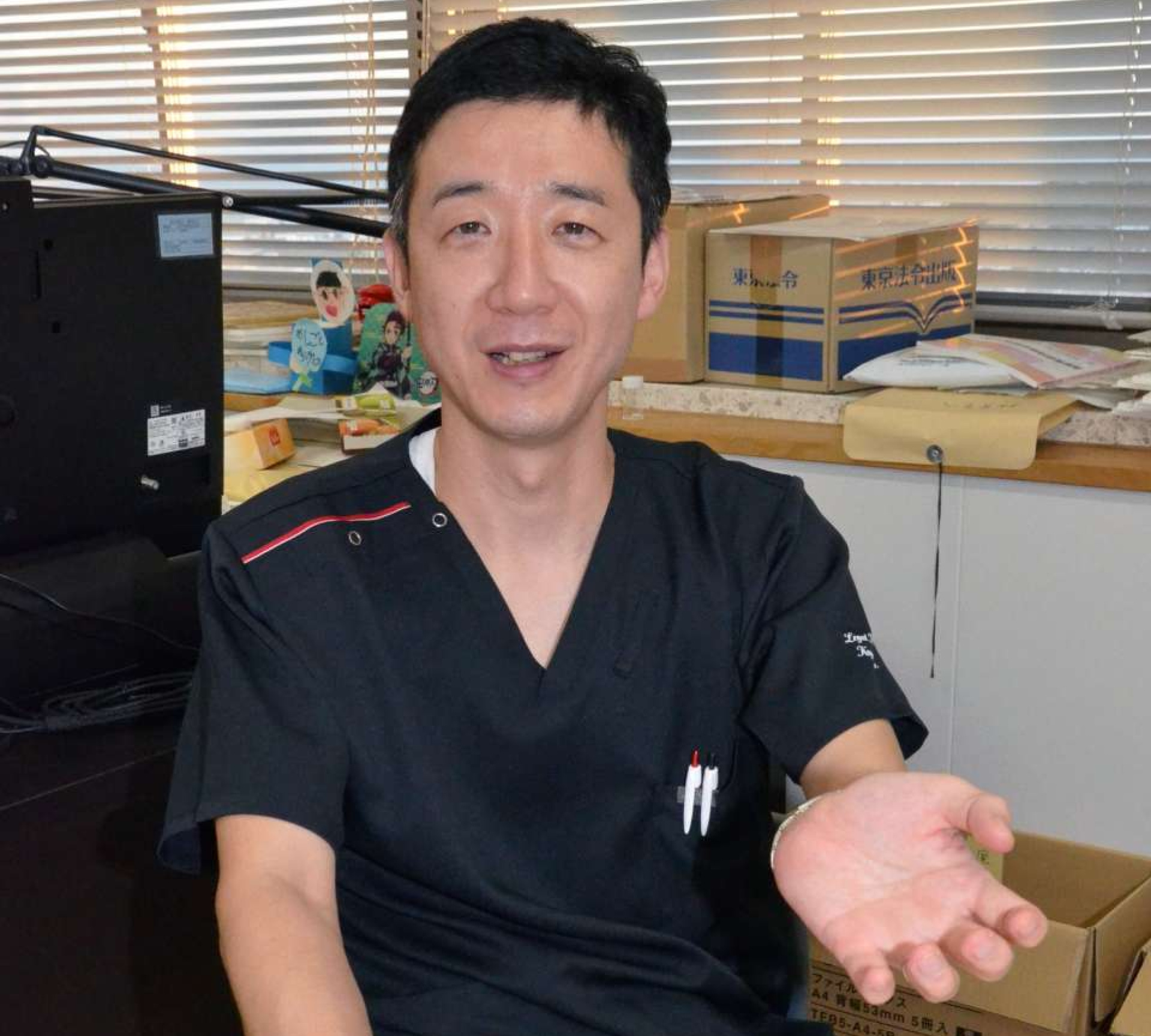 ヒートショックの危険性を説明する鹿児島大学の林敬人教授＝鹿児島市の鹿児島大学桜ケ丘キャンパス