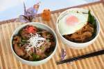 〈資料写真〉シカハンバーグの大根おろしソース丼（右）と、イノシシ肉甘辛ショウガ焼き丼