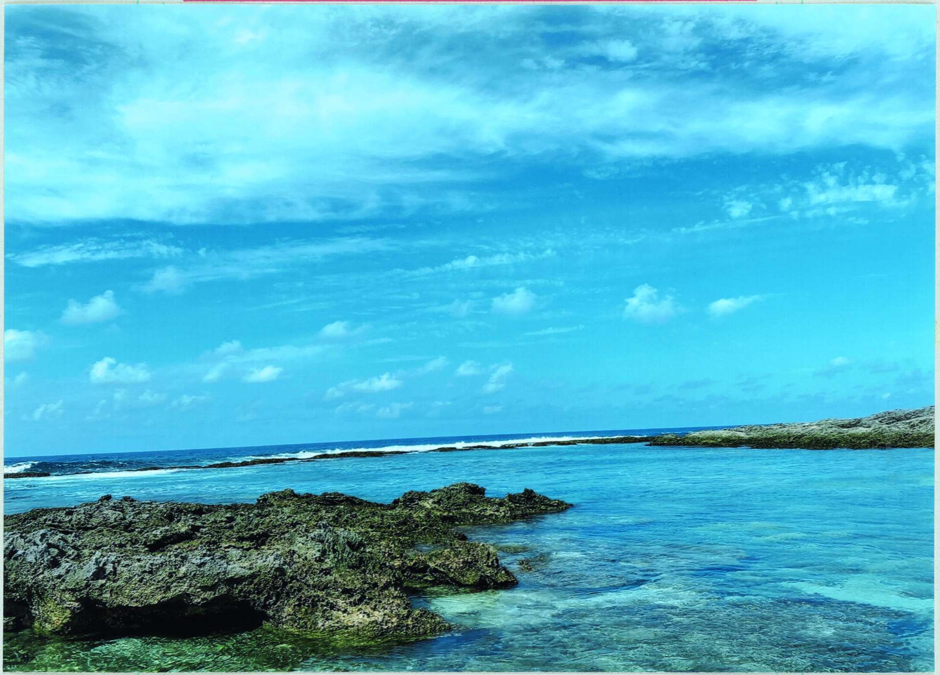受賞作「大好きなきかい島の海」の「○」写真（出光興産提供）