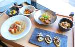 豚骨（左下）、きがら茶飯（右上）など、鹿児島ゆかりの偉人にちなんだ料理＝２１日、鹿児島市のシェラトン鹿児島