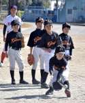 〈関連〉ノックを受ける国分北ジャイアンツの子どもたち＝霧島市の隼人工業高校グラウンド