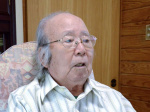 「流れ着いた遺体は言葉にできないほど無残だった」と話す大島安徳さん＝宇検村宇検
