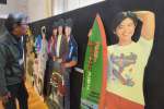 アイドルの等身大パネルが並ぶ会場＝２１日、南さつま市民会館大ホール
