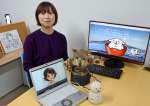 方言ＡＩの動画やロボットを開発した坂井美日准教授＝１２日、鹿児島市の鹿児島大郡元キャンパス