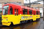 カルビー鹿児島工場操業５０周年を記念したラッピング電車＝１日、鹿児島市交通局