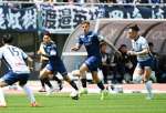 前半、サイドを攻め上がる鹿児島Ｕのアンジェロッティ＝鹿児島市の白波スタジアム