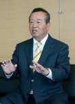伊仙町長選に初当選した伊田正則氏＝１２日、伊仙町役場