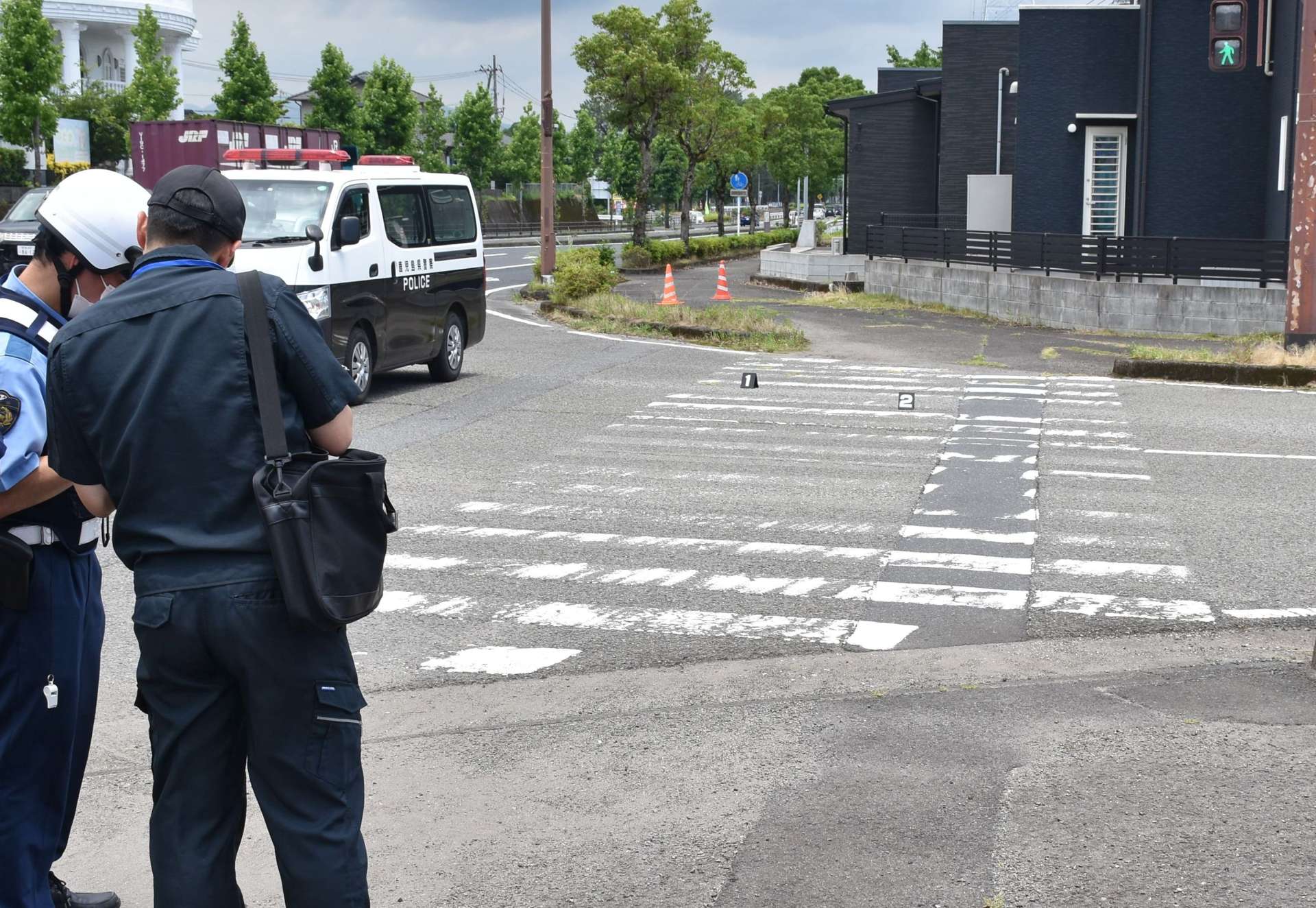 車と自転車が衝突した事故現場＝２１日、姶良市脇元