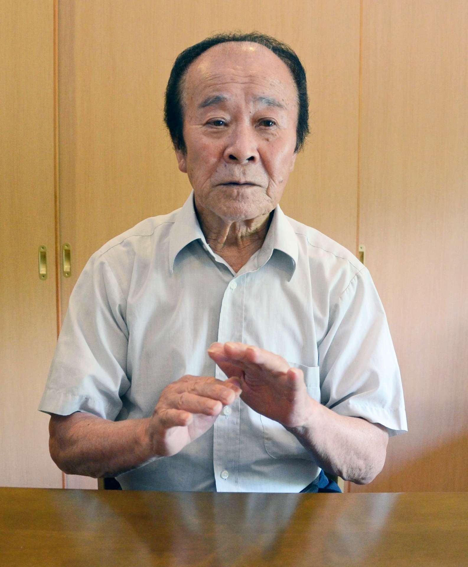 「時間がない」と訴える市川健一さん＝６日、鹿屋市輝北
