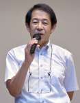 風力発電について講演する武田恵世さん＝２１日、いちき串木野市のいちきアクアホール