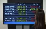 史上最高値を更新した日経平均株価の終値５万５１２円３２銭を示す電光表示＝２７日、鹿児島市の野村証券鹿児島支店（佐伯直樹撮影）